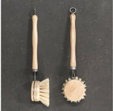 Washing up brush from east of india with wooden handle