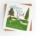 Happy Birthday Dad card with illustrated golf course, flag, bunkers and pine trees with kraft envelope