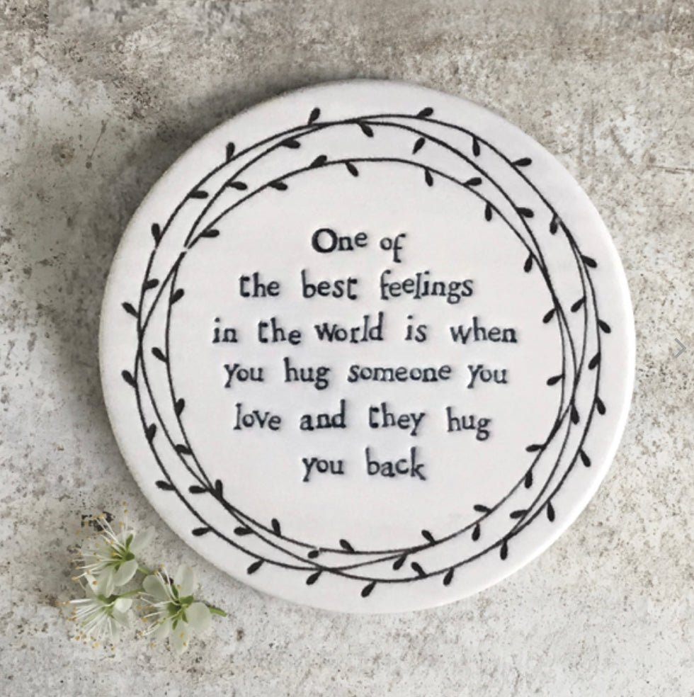 One of the best feelings in the world is when you hug someone you love and they hug you back coaster