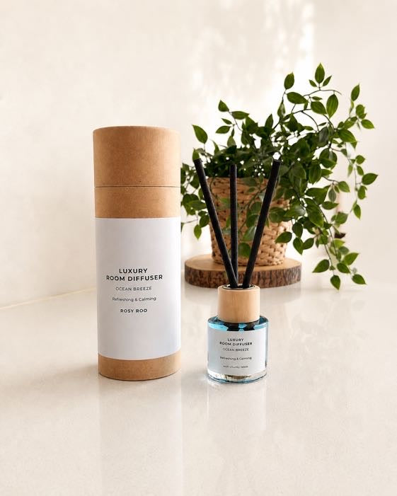 Rosy Roo luxury room reed diffuser in Ocean Breeze with gift tube packaging and black reeds