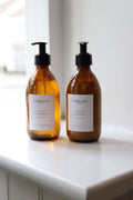  Bumble & Bee Lifestyle Ginger & Orange hand wash and hand lotion in amber glass pump bottles