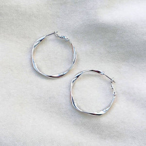 Silver twisted hoops by jack and freda