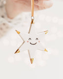 White Star Ceramic Ornament With a Smiley Face & Gold Tips