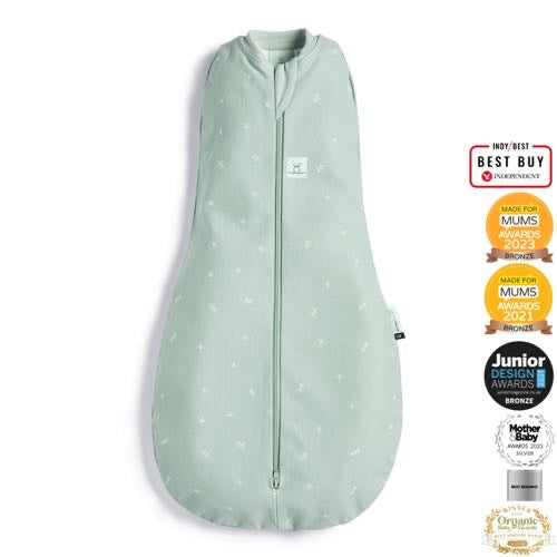 Baby in ergoPouch Cocoon Swaddle Bag 1.0 TOG in sage green with leaf print