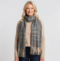 Green multicolour check scarf with cream tassel ends styled on a mannequin