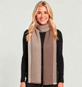 A soft two-tone taupe mocha brown and cream ivory woven wrap scarf with a diagonal ribbed texture and fringe hem, styled as an elegant gift for her.